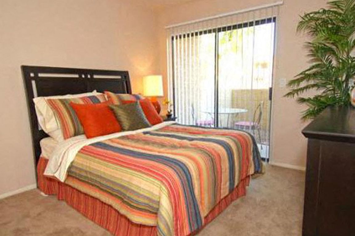 Bright Bedroom Space with Patio Access