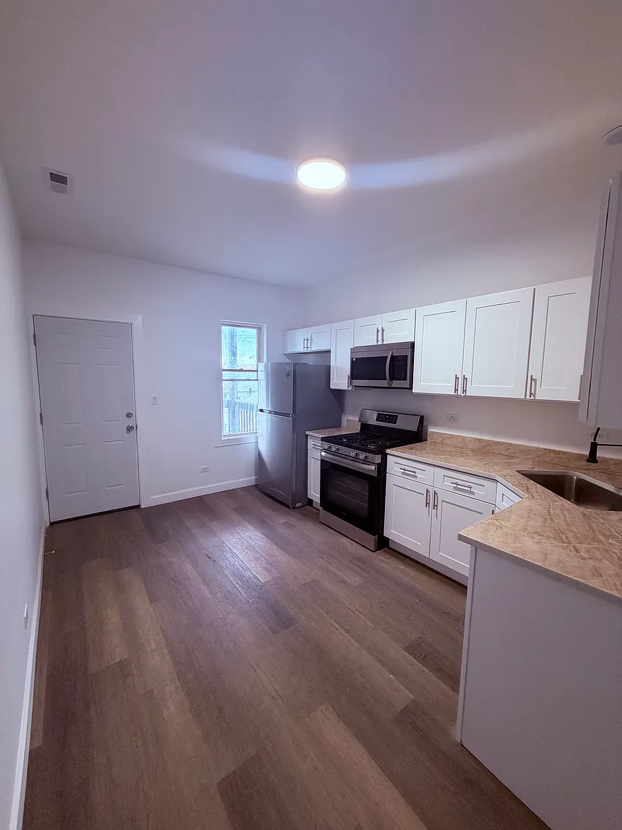 Building Photo - 8739 S Colfax Ave #2