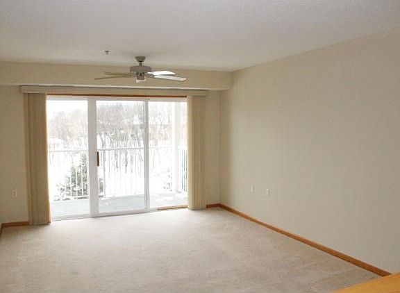 Large living room with ceiling fan