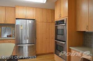 French door fridge next to pantry