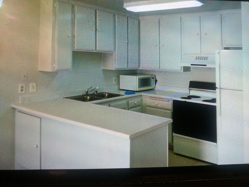 1st image of 6815 Remmet Ave Unit 312