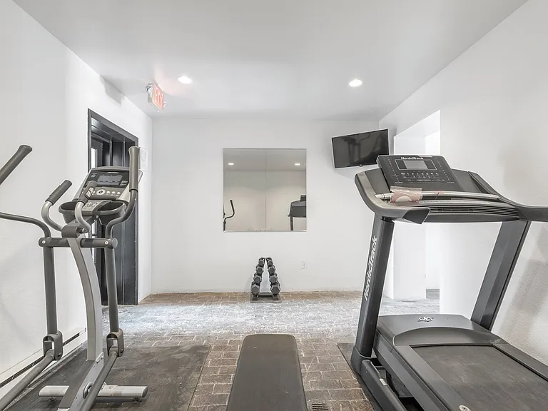 Work Out Area - treadmill, eliptical, weights, tv with wifi