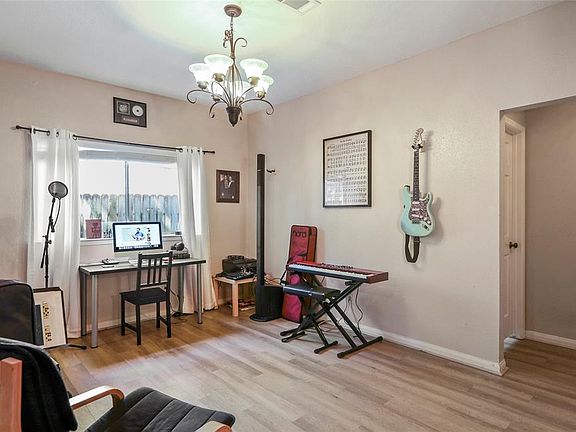 Formal dining room currently being used as a music room.