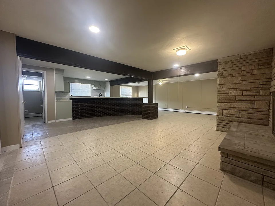 Open oversized living space with LR, Dining, Kitchen