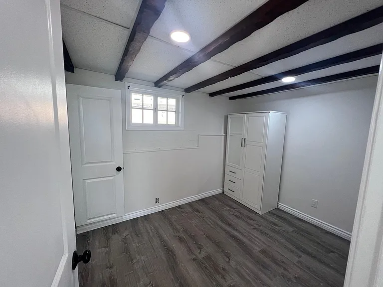 Bedroom. Closet can come out if you don't like. The bathroom would be on the left side (bathroom door is open in picture).