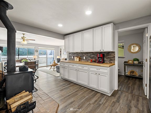 Main level living quarters offer one bedroom, 3/4 bath, spacious kitchen, dining area and family room. 