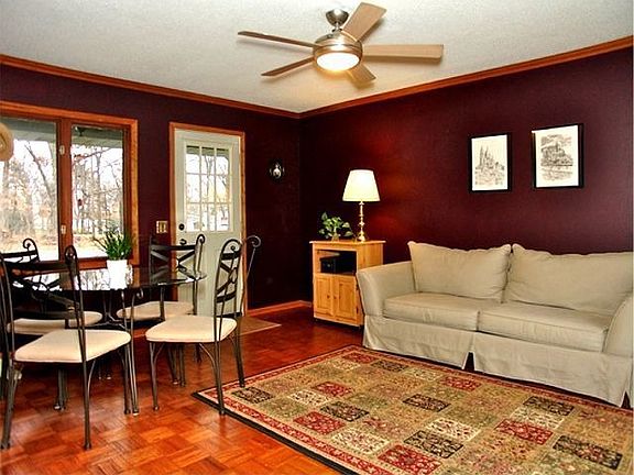Family room has dining area and parquet hardwood floors.
