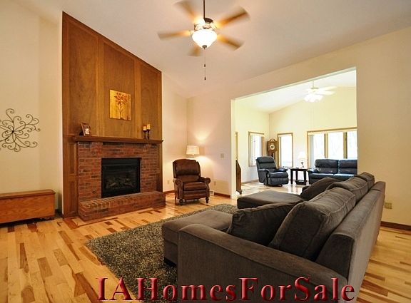 Great Room. 3/4" solid hickory wood floors, Mendota fireplace with remote and auto/manual blower fan.