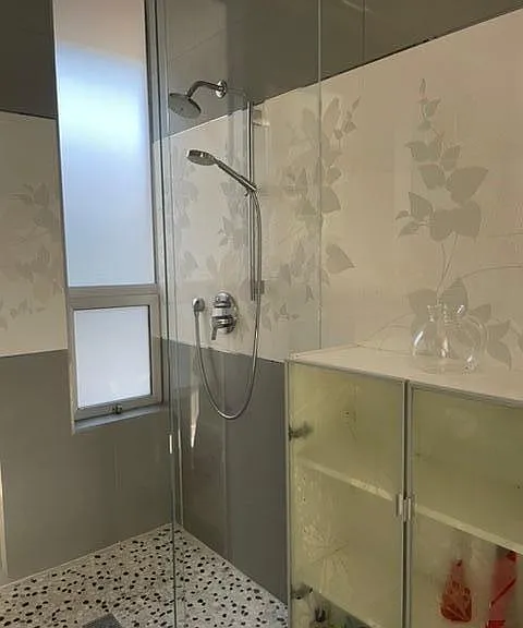 Standing shower in the bathroom