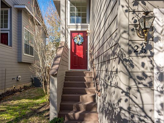 Beautifully painted front door makes for a warm greeting to visitors.