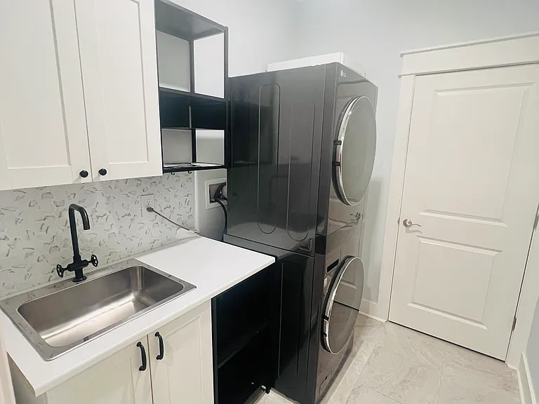 Laundry room with extra storage and convenience