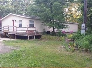 8735 Garbow Rd, Howard City, MI 49329