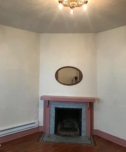 Original fireplace, now a "candleplace"!