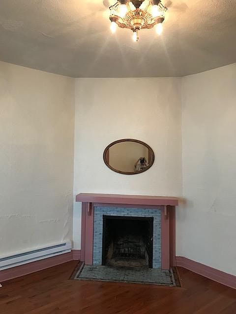 Original fireplace, now a "candleplace"!