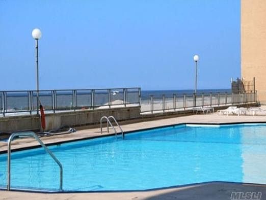 Heated ocean front pool with direct beach access.