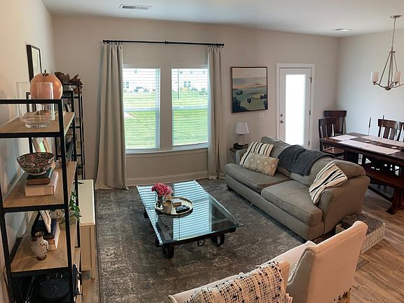 Open-concept living area that flows into the dining room.