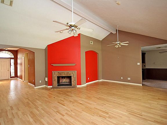 Cozy fireplace and soaring ceilings!