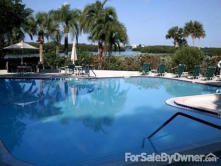 Swimming pool
						:
						One of six pools in Pelican cove. This one with a view of the bay.