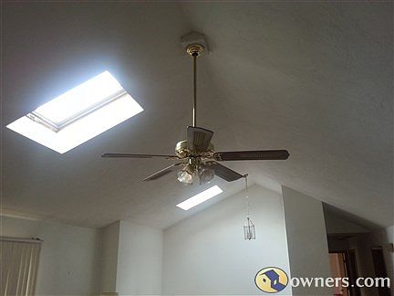 front entrance showing skylight and ceiling fan