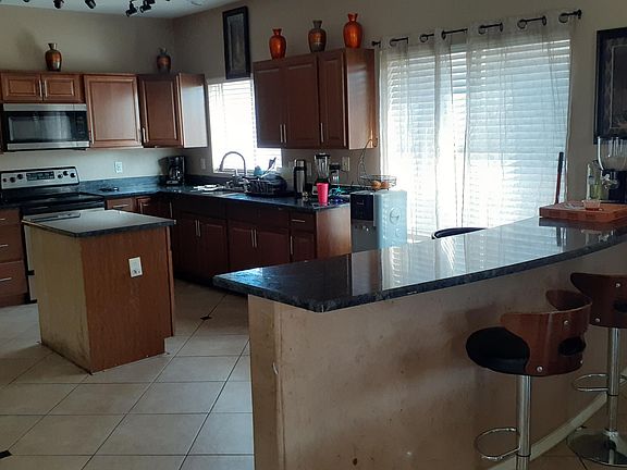 4th image of 6343 W Hilton Ave