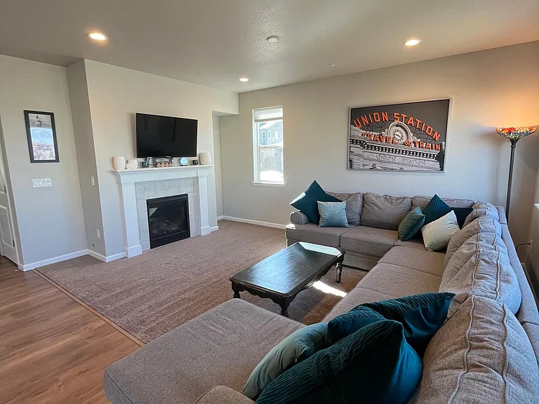 Fully functional gas fireplace and living room mountain views