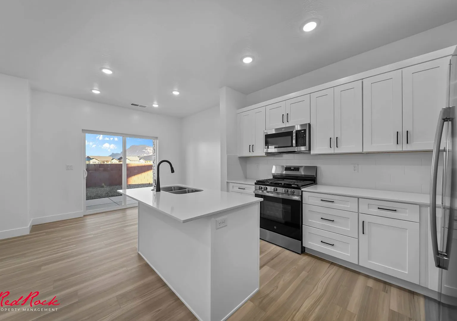 A Little More Room to Love in this 4 Bedroom Townhome! — Photo 1