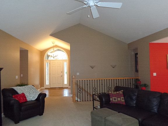 Large foyer opens into the great room. The office is located off the foyer. Open stairway to the basement.