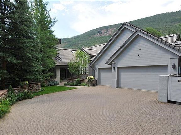 Driveway and exterior of garages.