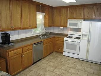 Kitchen with Tile Flooring & Gas Range