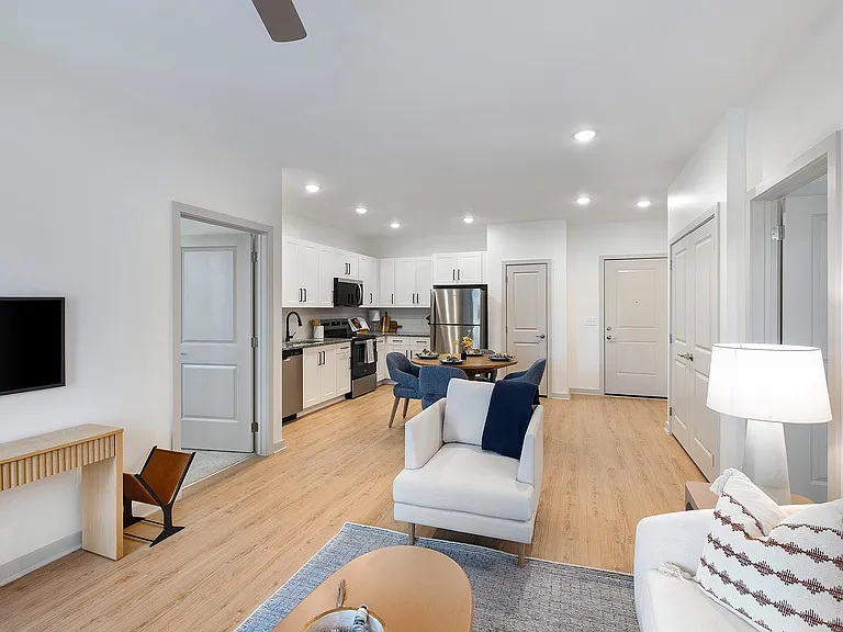 Model Home Living to Kitchen