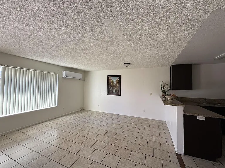 Kitchen overlook to a huge living room