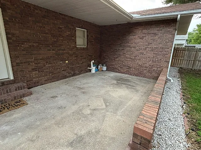 Partially covered back deck for shade and grilling in inclement weather!