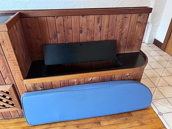 Storage inside cushioned living room seating