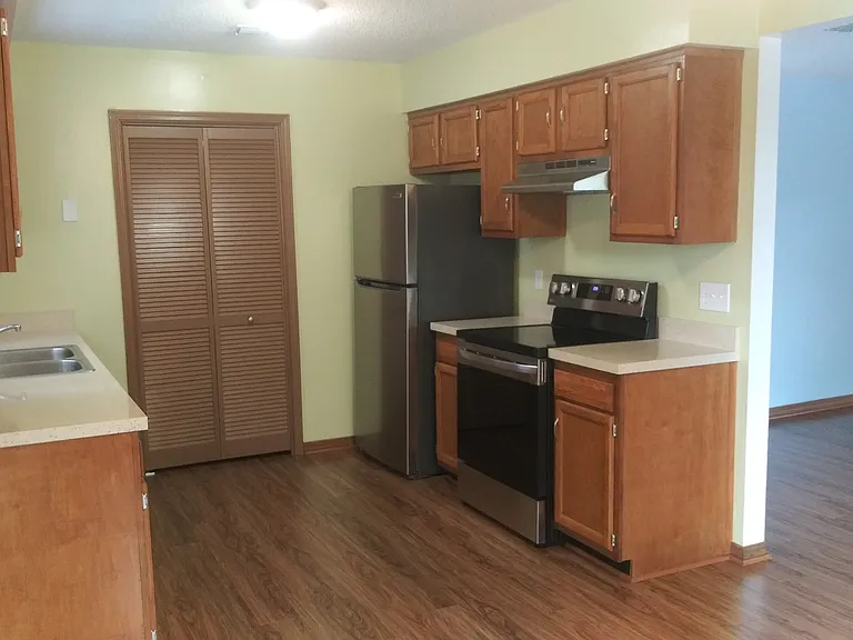 Kitchen with all new stainless steel appliances.