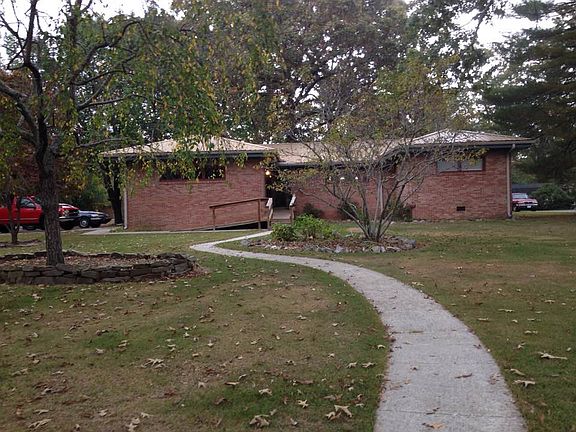 Winding walkway, flowerbeds