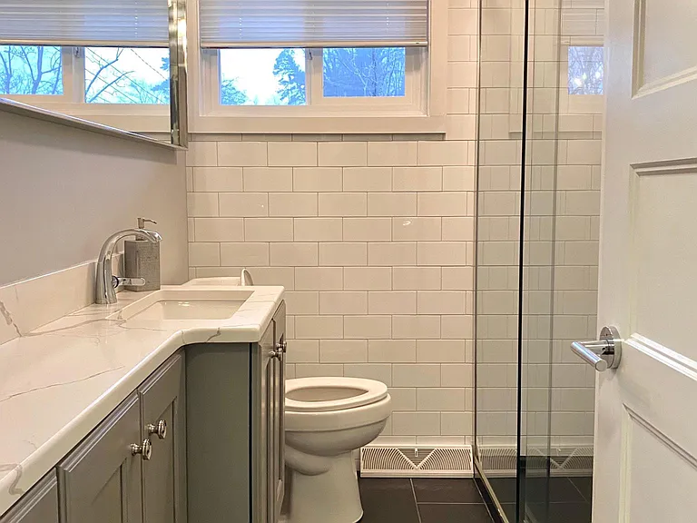 Large glass shower in remodeled bathroom