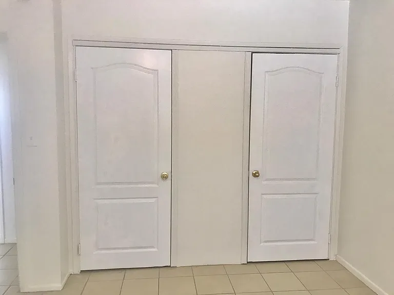 Westside bedroom closet door -1