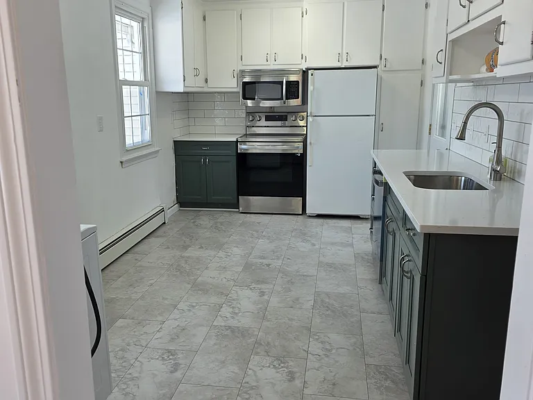 Fully remodled and renovated kitchen. New appliances, cabinets, granite countertops. New floors, paint through the entire house
