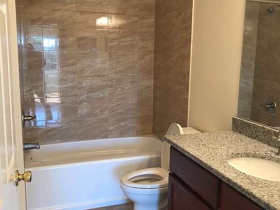 main bathroom, granite vanity top, tub/shower combo, all bra