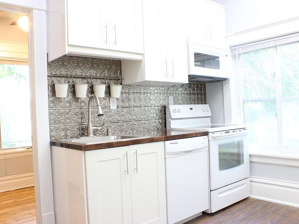 Kitchen with dishwasher and over the range microwave