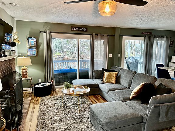 Living Room w/ Wall of Sliding Doors.