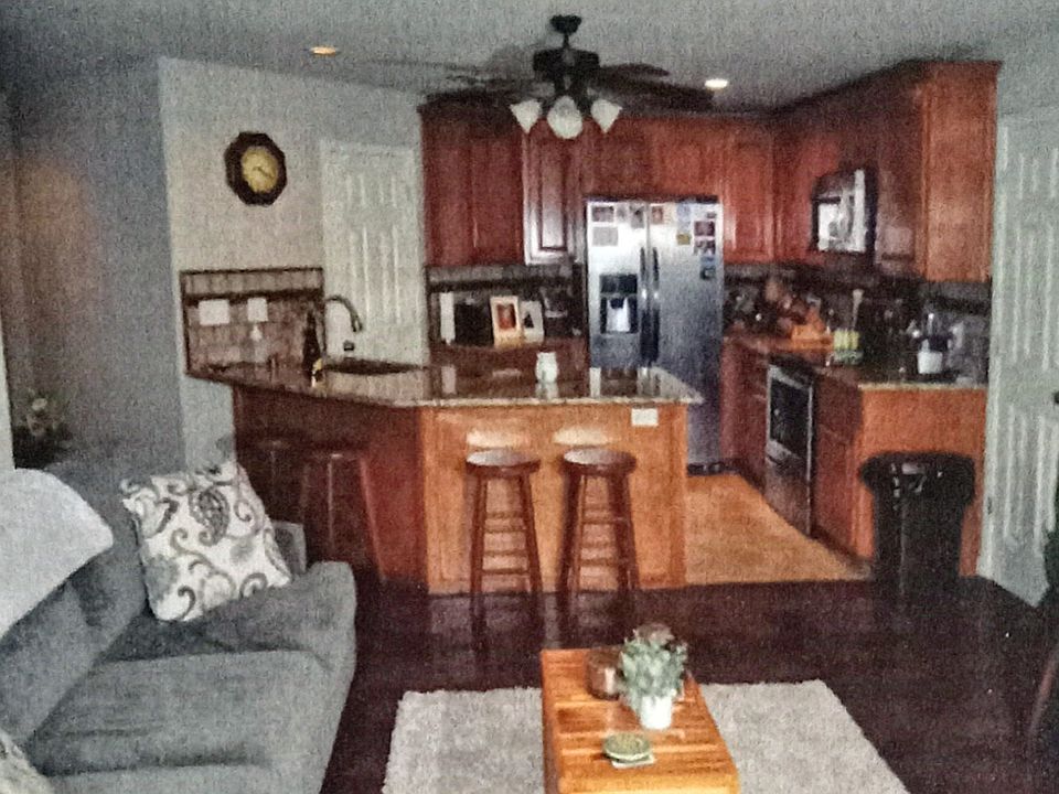 OPEN CONCEPT LIVING
 WITH HARDWOOD FLOORS