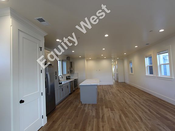 open kitchen, dining, and living