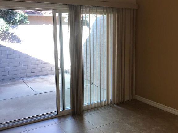 Vertical Blinds off Dining Room