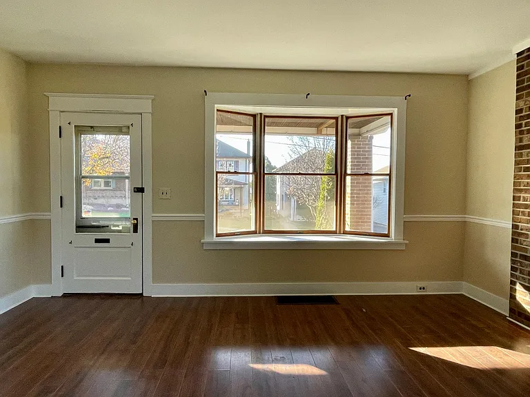 Tons of natural light and on a tree lined street with lots of parking.