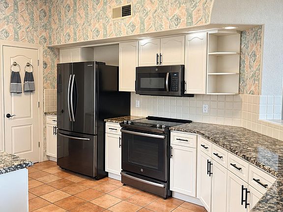 5th image of 9208 Masini Ln NW