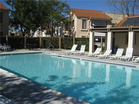 Community Pool just steps from the front door (unit is first floor in background)