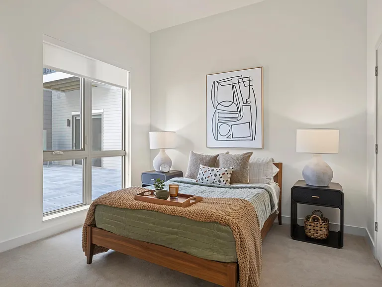 Spacious bedrooms with plush carpet and large closets.