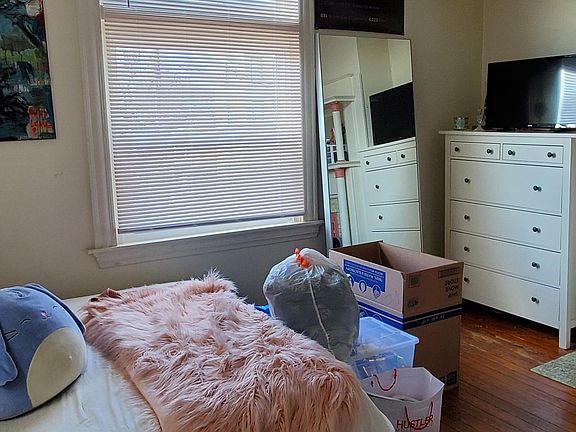 Bedroom with hardwood floors