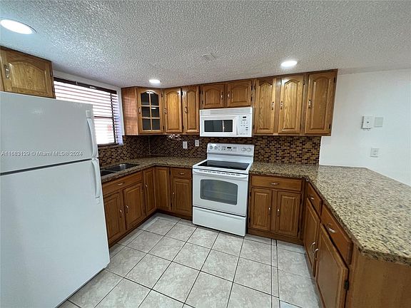 3rd image of 5525 W 26th Ct APT 208